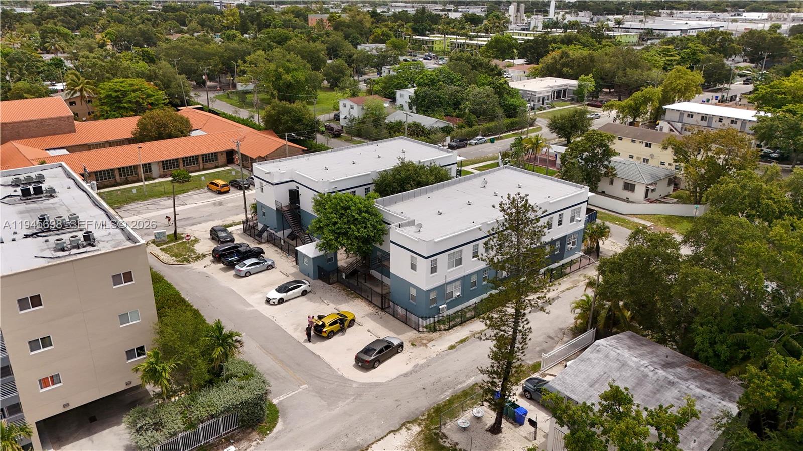 36 Northeast 65th Street Miami, FL 33138 - Photo 5 of 6 an aerial view of multiple houses with yard