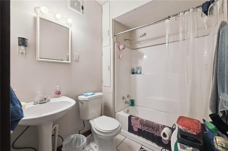 322 North 4th Street Apollo, PA 15613 - Photo 5 of 11 a bathroom with a sink toilet and shower