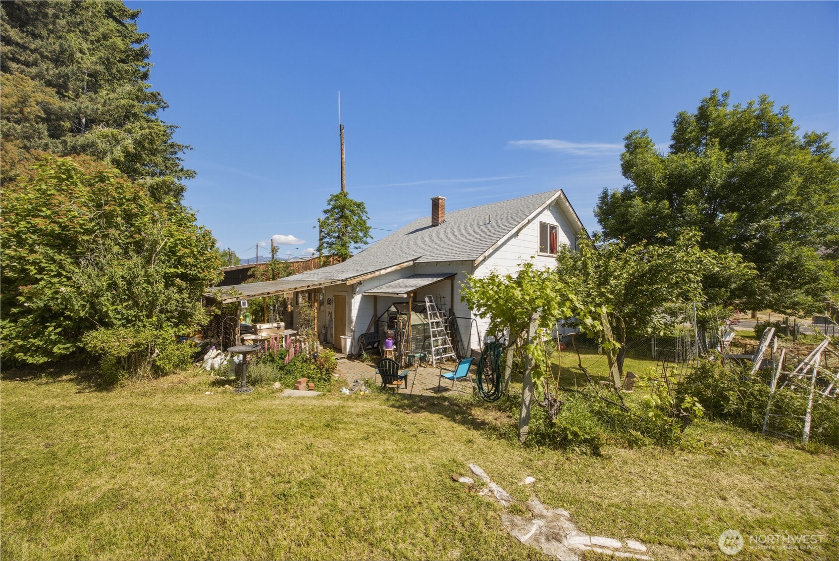 1281 Totem Pole Road Manson, WA 98831 - Photo 28 of 39 a front view of a house with a yard