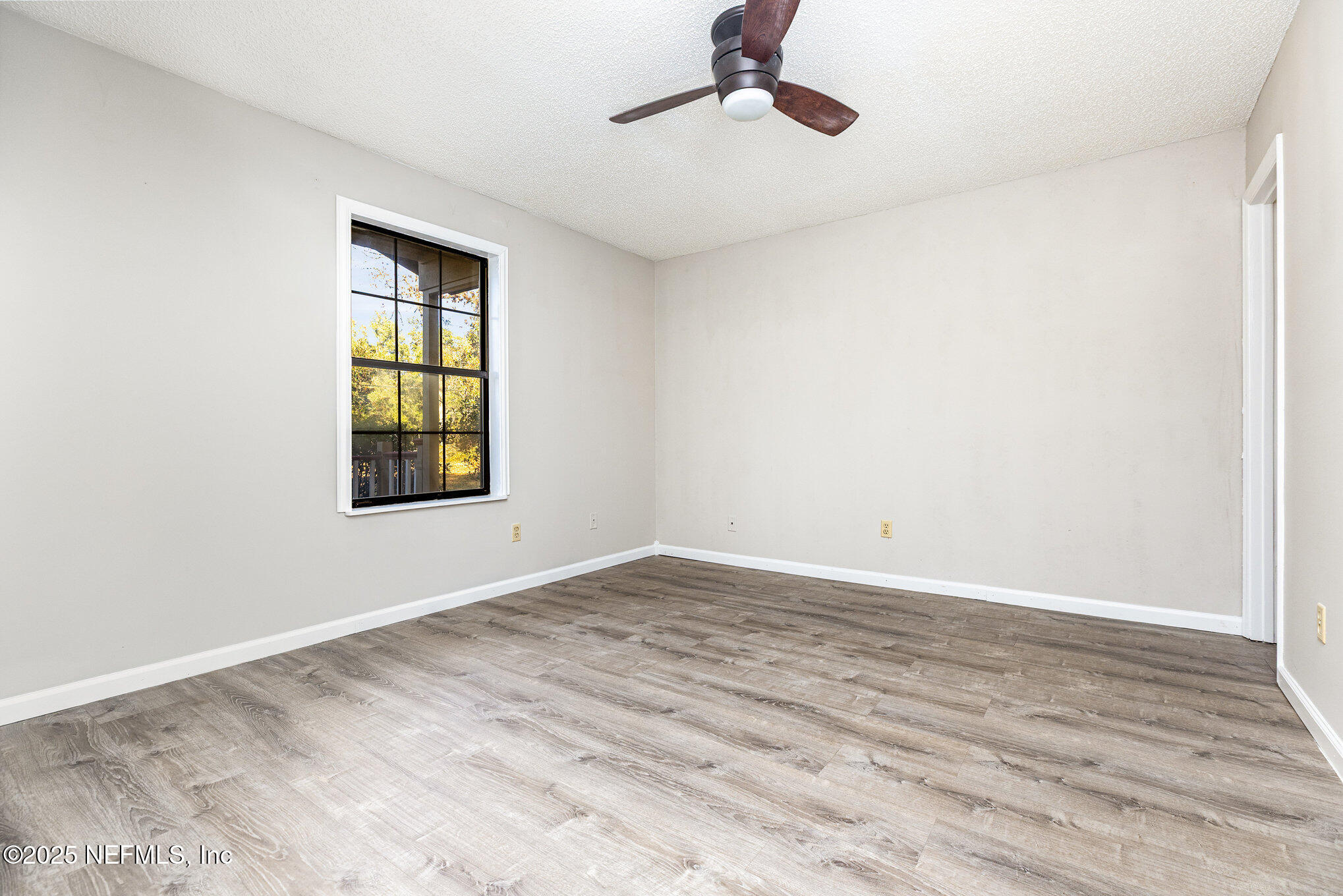 4341 Chokeberry Road Middleburg, FL 32068 - Photo 20 of 38 a view of an empty room with a window