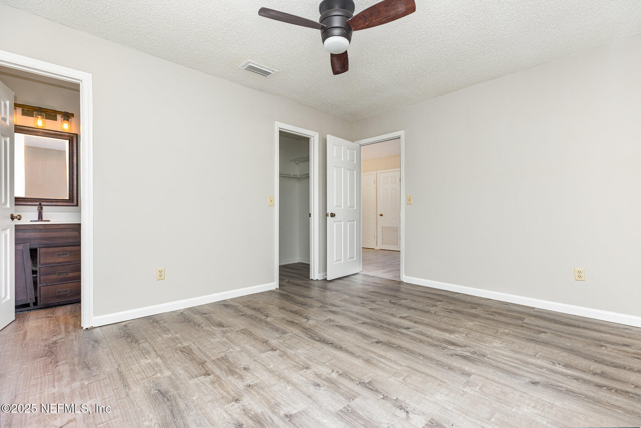 4341 Chokeberry Road Middleburg, FL 32068 - Photo 21 of 38 wooden floor in an empty room
