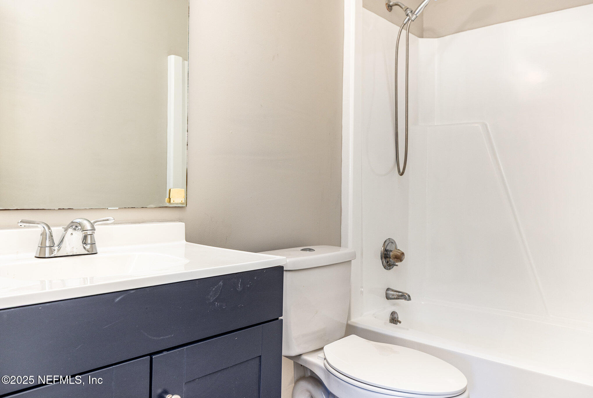 4341 Chokeberry Road Middleburg, FL 32068 - Photo 29 of 38 a bathroom with a sink a toilet and shower