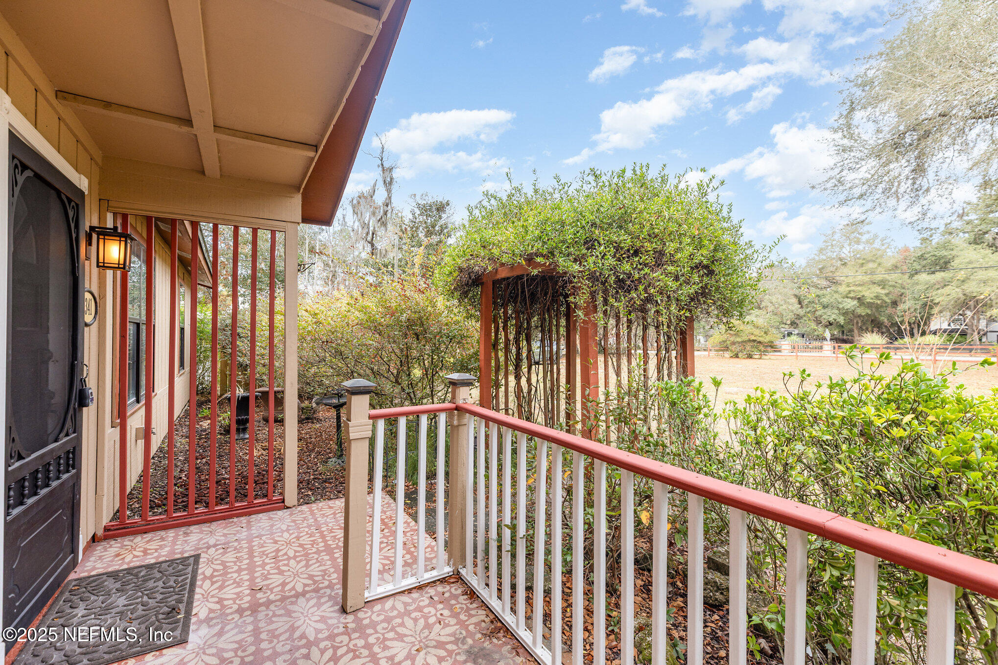 4341 Chokeberry Road Middleburg, FL 32068 - Photo 5 of 38 a view of a porch