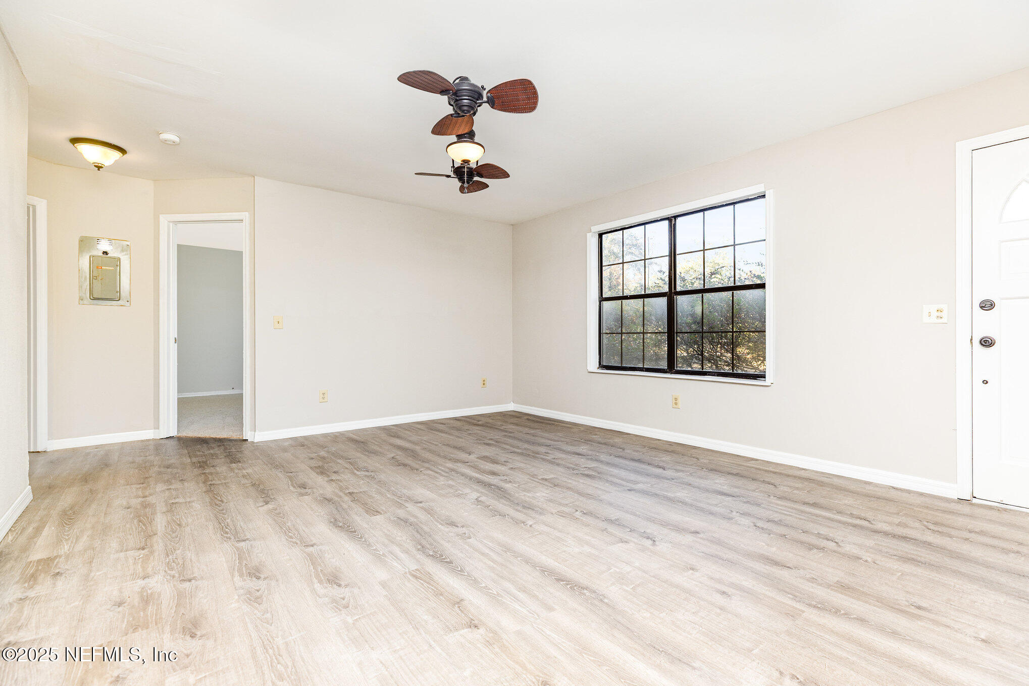 4341 Chokeberry Road Middleburg, FL 32068 - Photo 8 of 38 a view of empty room with windows