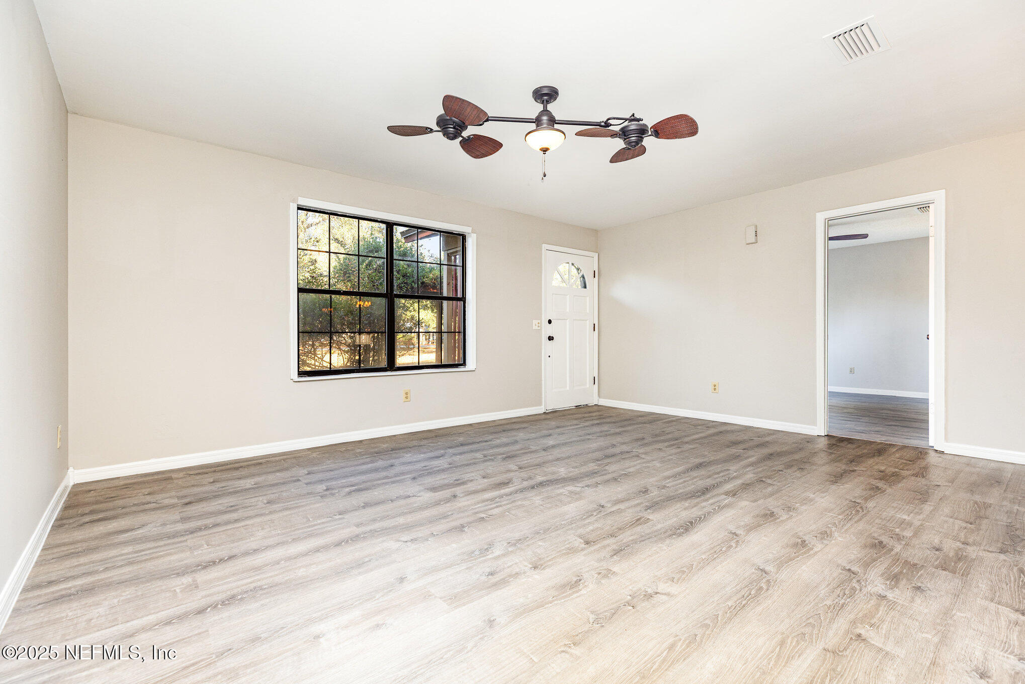 4341 Chokeberry Road Middleburg, FL 32068 - Photo 9 of 38 a view of an empty room with a window
