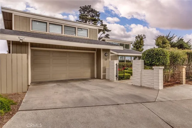 a view of a house with a garage