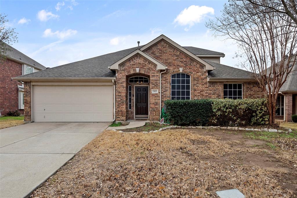 312 Ranch Trail Mansfield, TX 76063 - Photo 1 of 1 a front view of a house with a yard