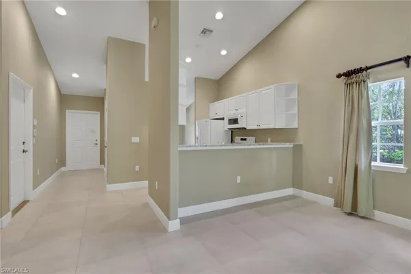 a view of kitchen and windows