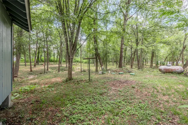 $1,000 | 7 A Hickory Lane, Huntsville, TX 77340
