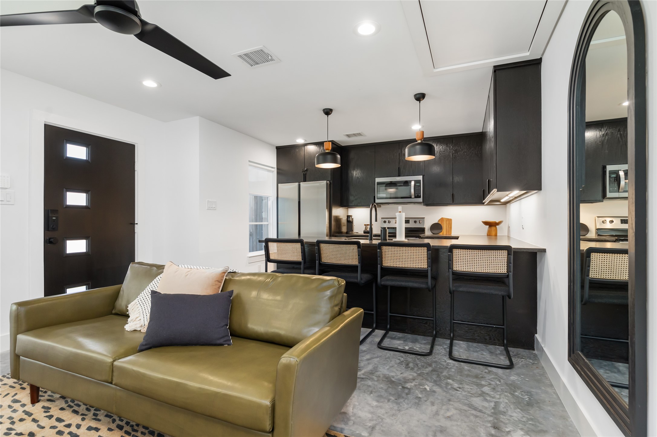 410 East 33rd Street Houston, TX 77018 - Photo 32 of 49 a living room with stainless steel appliances kitchen island granite countertop furniture and a view of kitchen