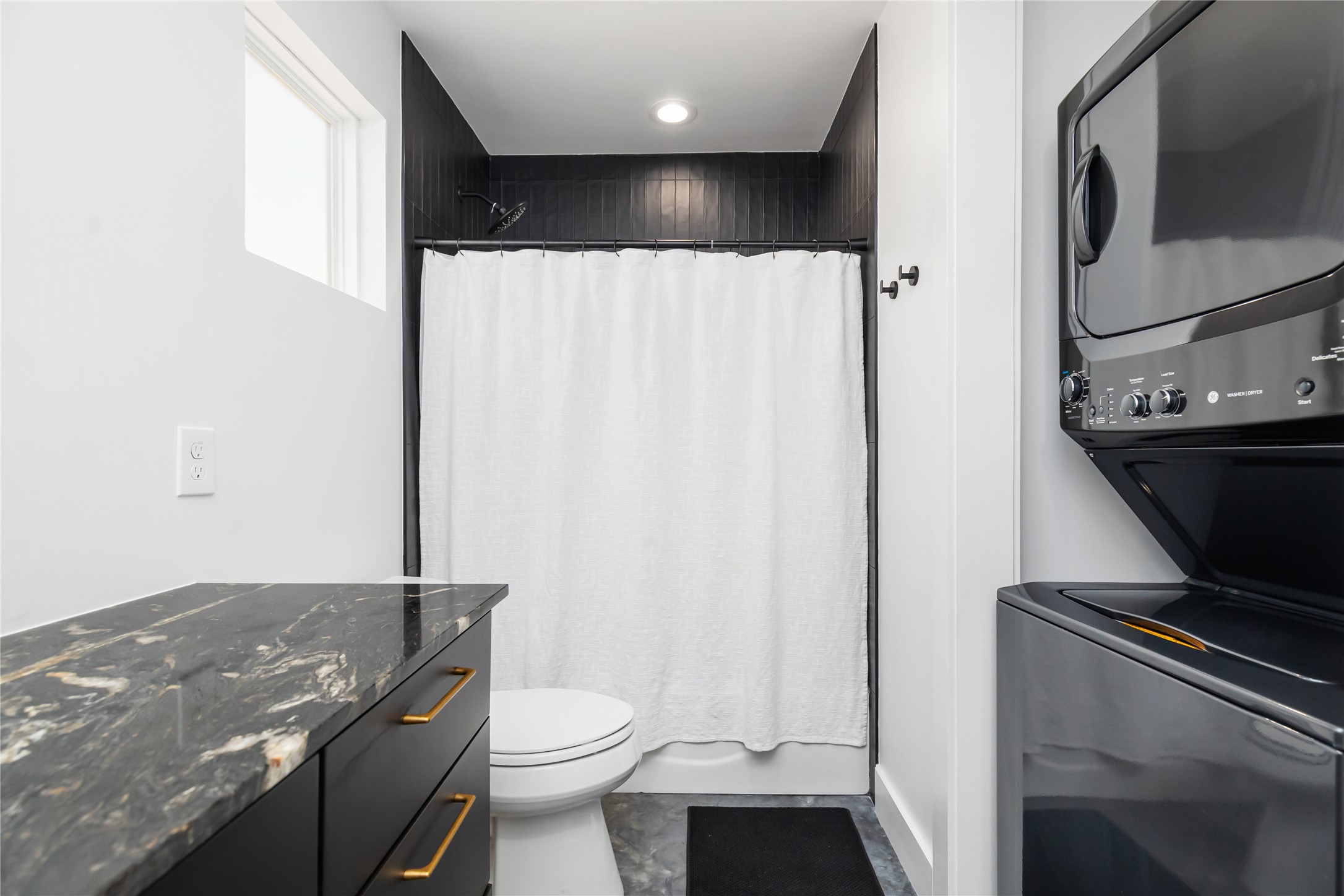 410 East 33rd Street Houston, TX 77018 - Photo 42 of 49 a bathroom with a granite countertop sink a toilet and a shower