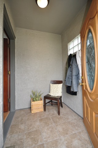 405 Blackhawk Road Riverside, IL 60546 - Photo 2 of 24 a living room with furniture and a window