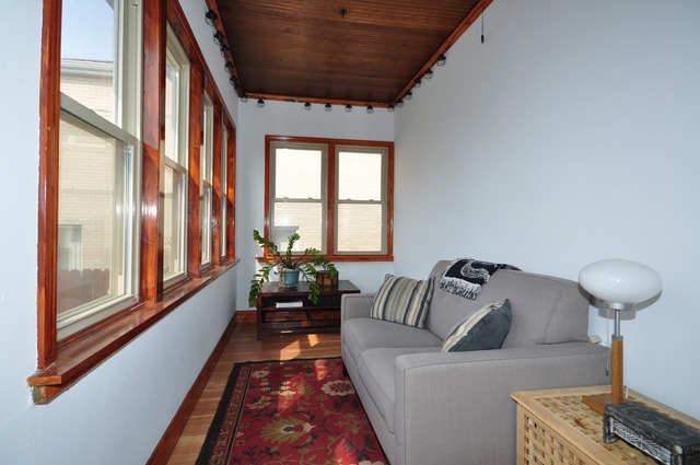 405 Blackhawk Road Riverside, IL 60546 - Photo 16 of 24 a living room with furniture and a large window