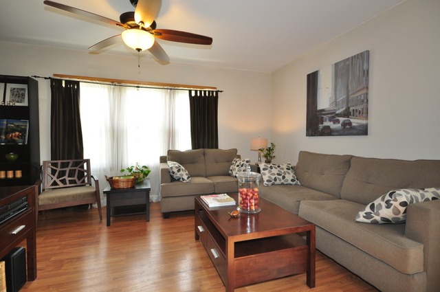 405 Blackhawk Road Riverside, IL 60546 - Photo 3 of 24 a living room with furniture and a large window