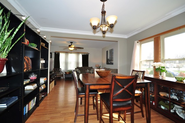 405 Blackhawk Road Riverside, IL 60546 - Photo 5 of 24 a view of a dining room with furniture window and outside view