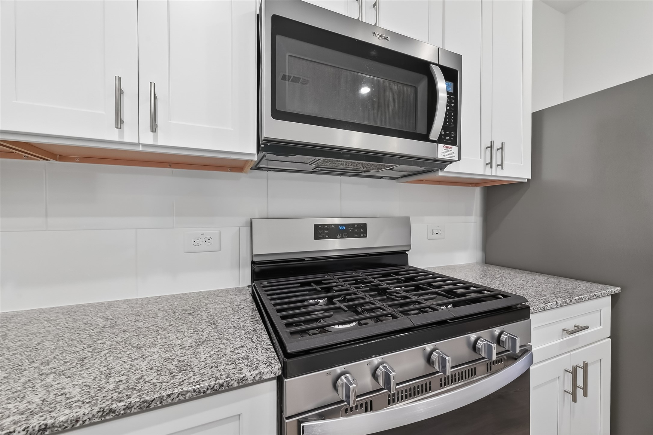 17902 Slurry Rake Lane Hockley, TX 77447 - Photo 6 of 32 a stove top oven sitting inside of a kitchen