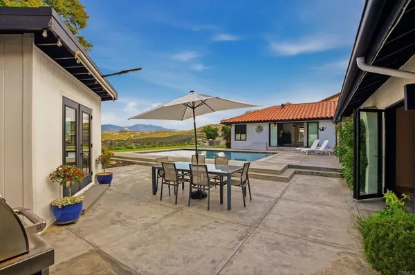 an outdoor space with furniture