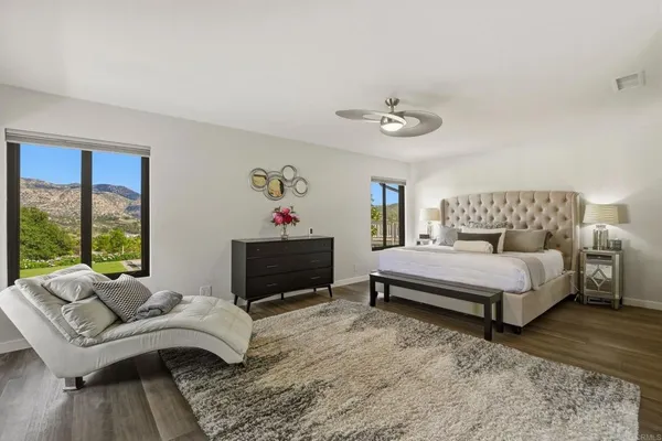 a bedroom with furniture and a couch