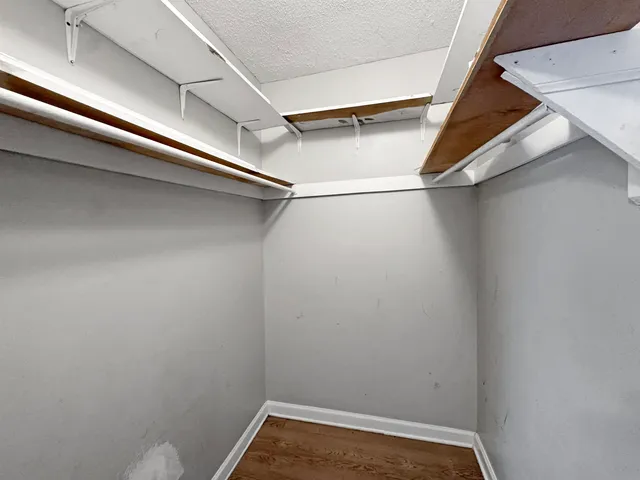 a view of a room with racks on the wall