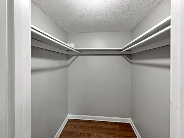 a empty closet with white paint