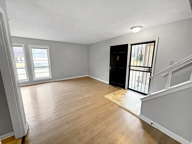 an empty room with windows