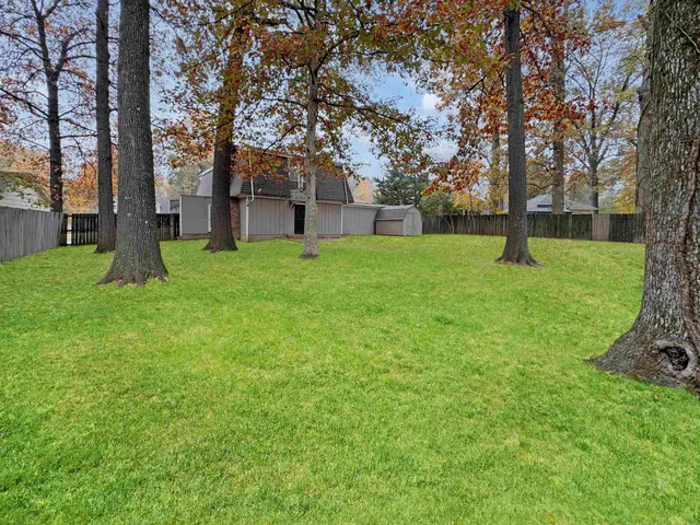 a fire hydrant in the middle of a field