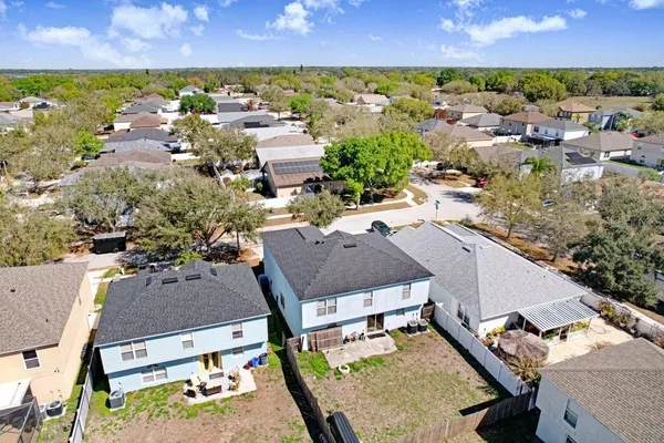 an aerial view of a house with a garden