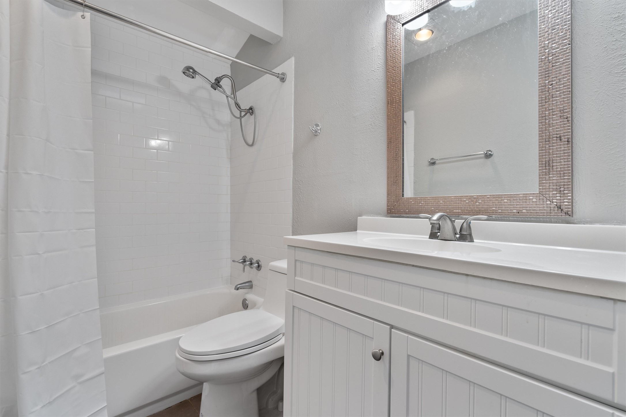 3415 Menchaca Road, Unit 113 Austin, TX 78704 - Photo 13 of 21 a bathroom with a sink a toilet and shower