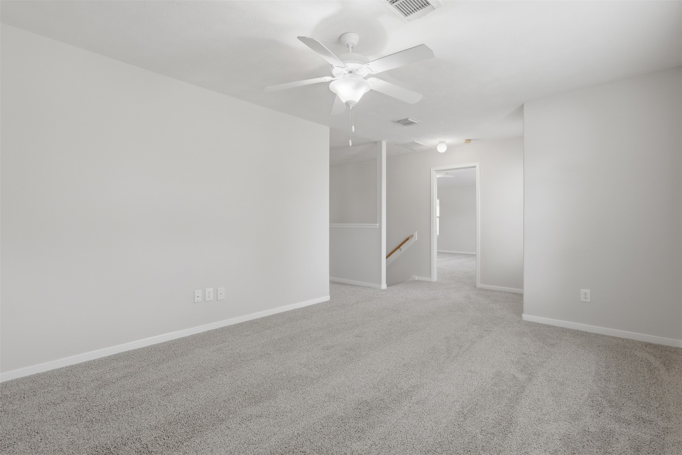 723 Slate Valley Lane Spring, TX 77373 - Photo 20 of 41 Spacious gameroom on the 2nd floor featuring fresh paint and brand new carpet—ready for your personal touch!