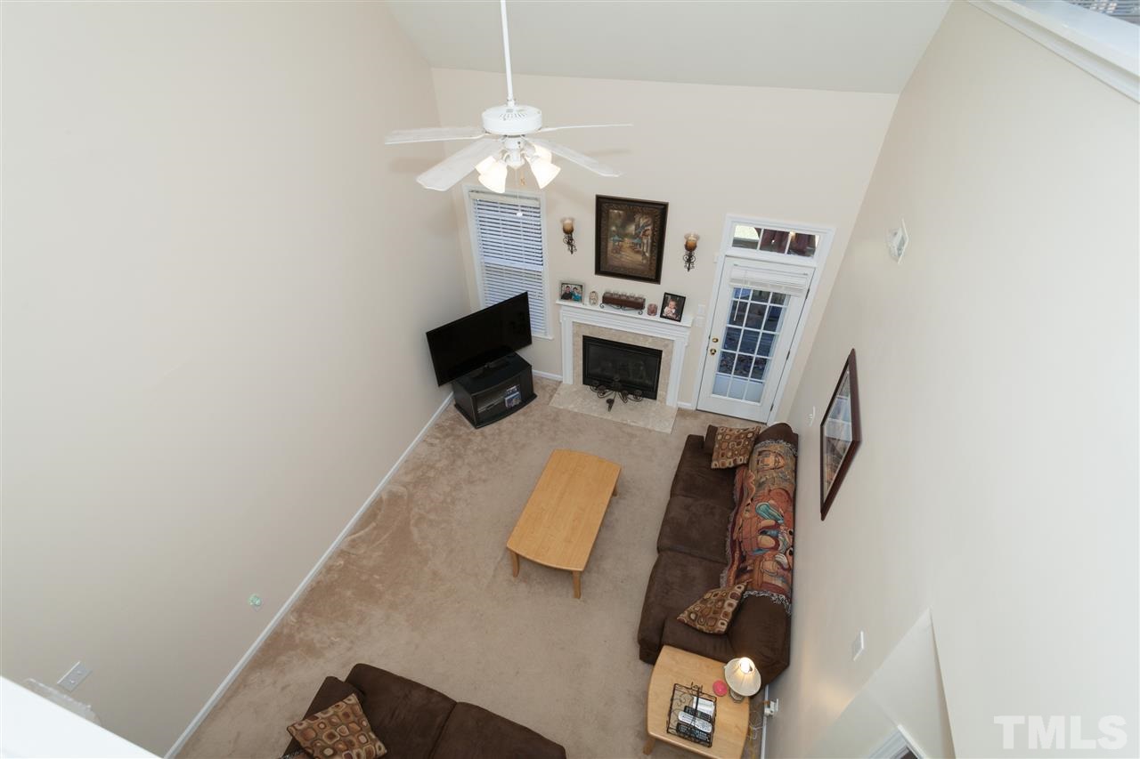 5602 Slide Rock Lane Raleigh, NC 27613 - Photo 10 of 19 a view of living room with furniture and flat screen tv