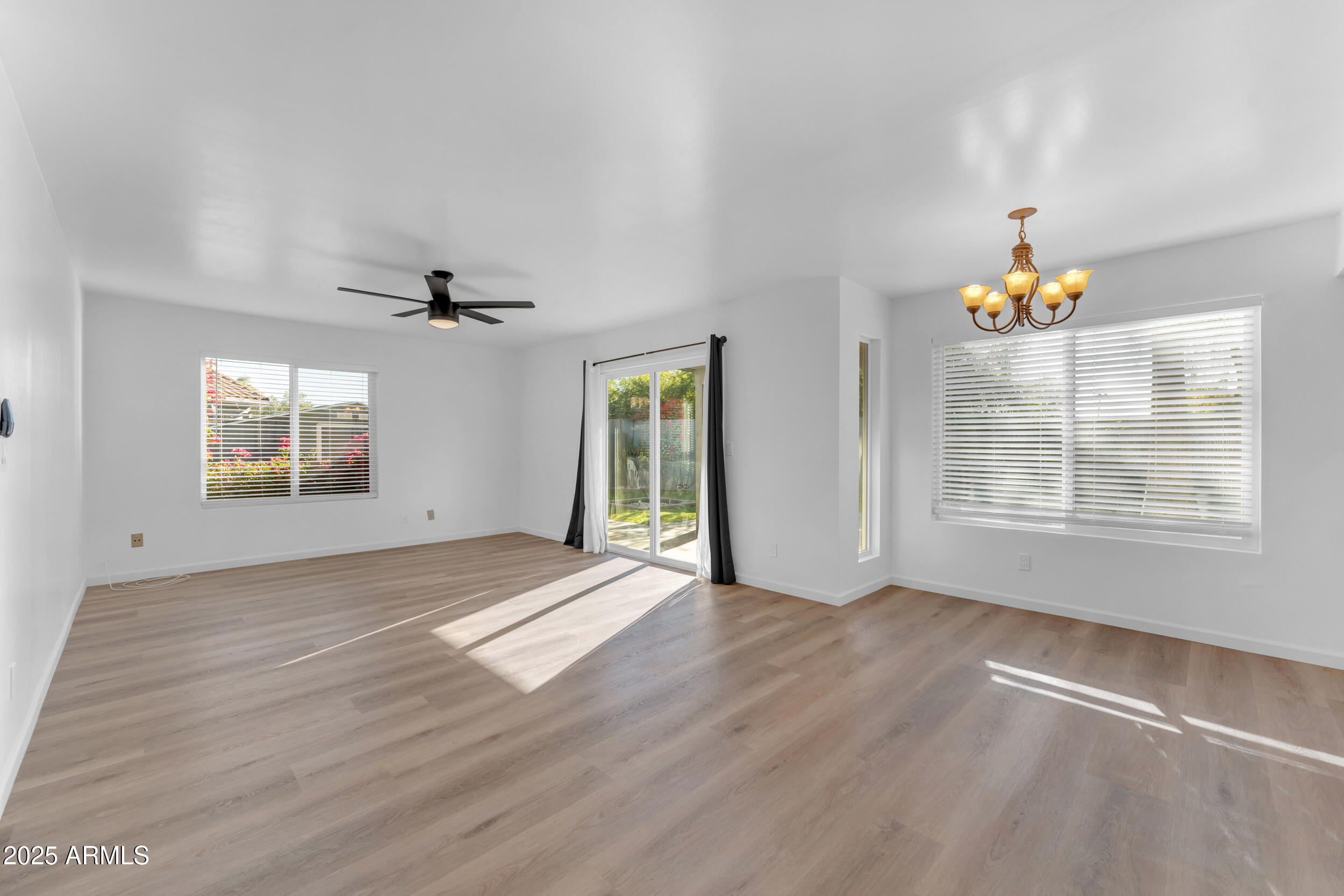 108 South Morning Ridge Drive Gilbert, AZ 85296 - Photo 15 of 49 a view of an empty room with a window