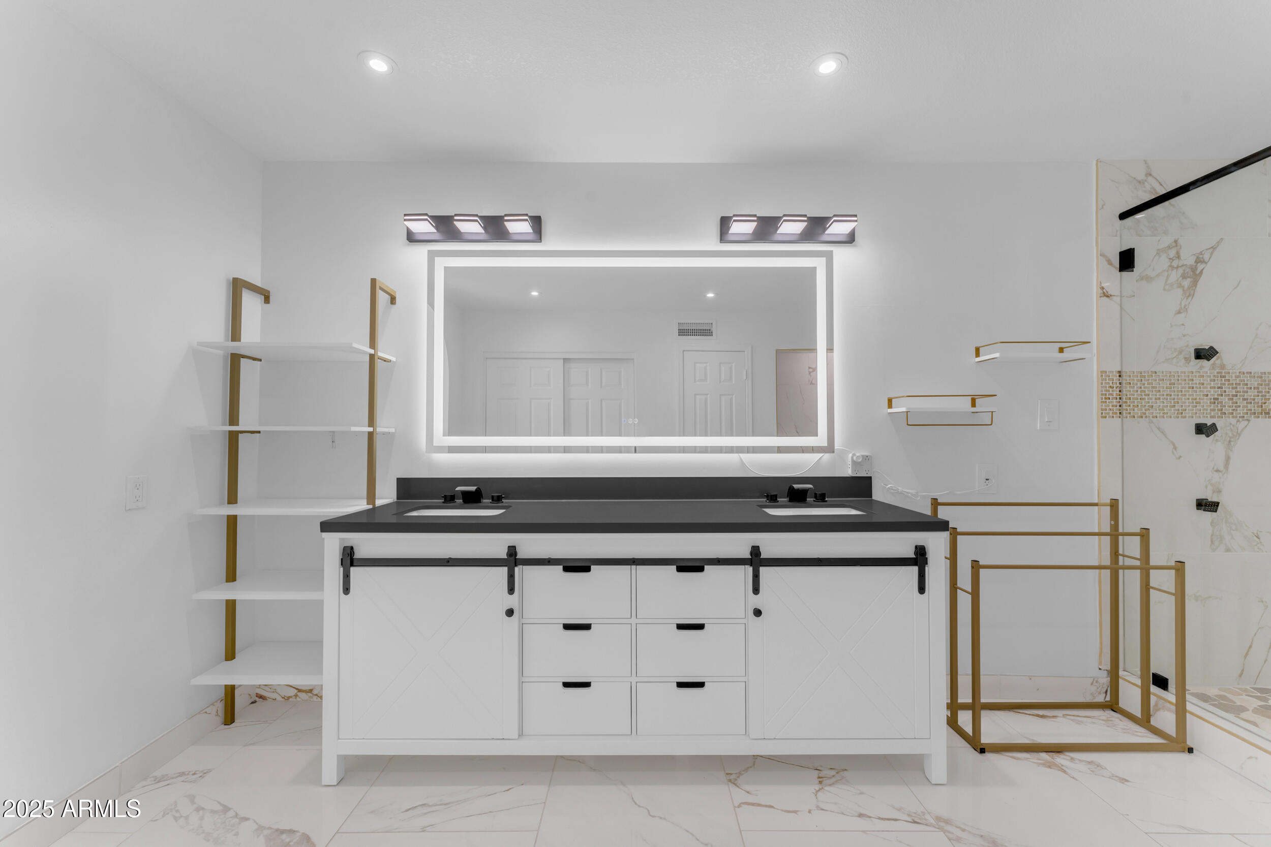 108 South Morning Ridge Drive Gilbert, AZ 85296 - Photo 34 of 49 a bathroom with a sink and a mirror