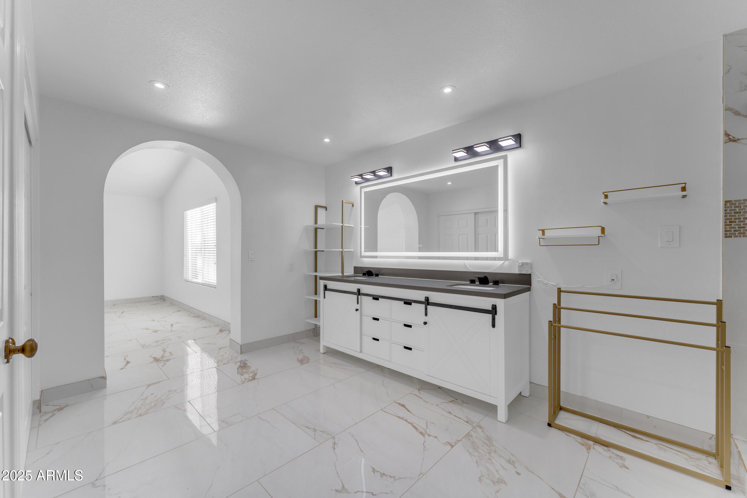 108 South Morning Ridge Drive Gilbert, AZ 85296 - Photo 37 of 49 a hall with white cabinets