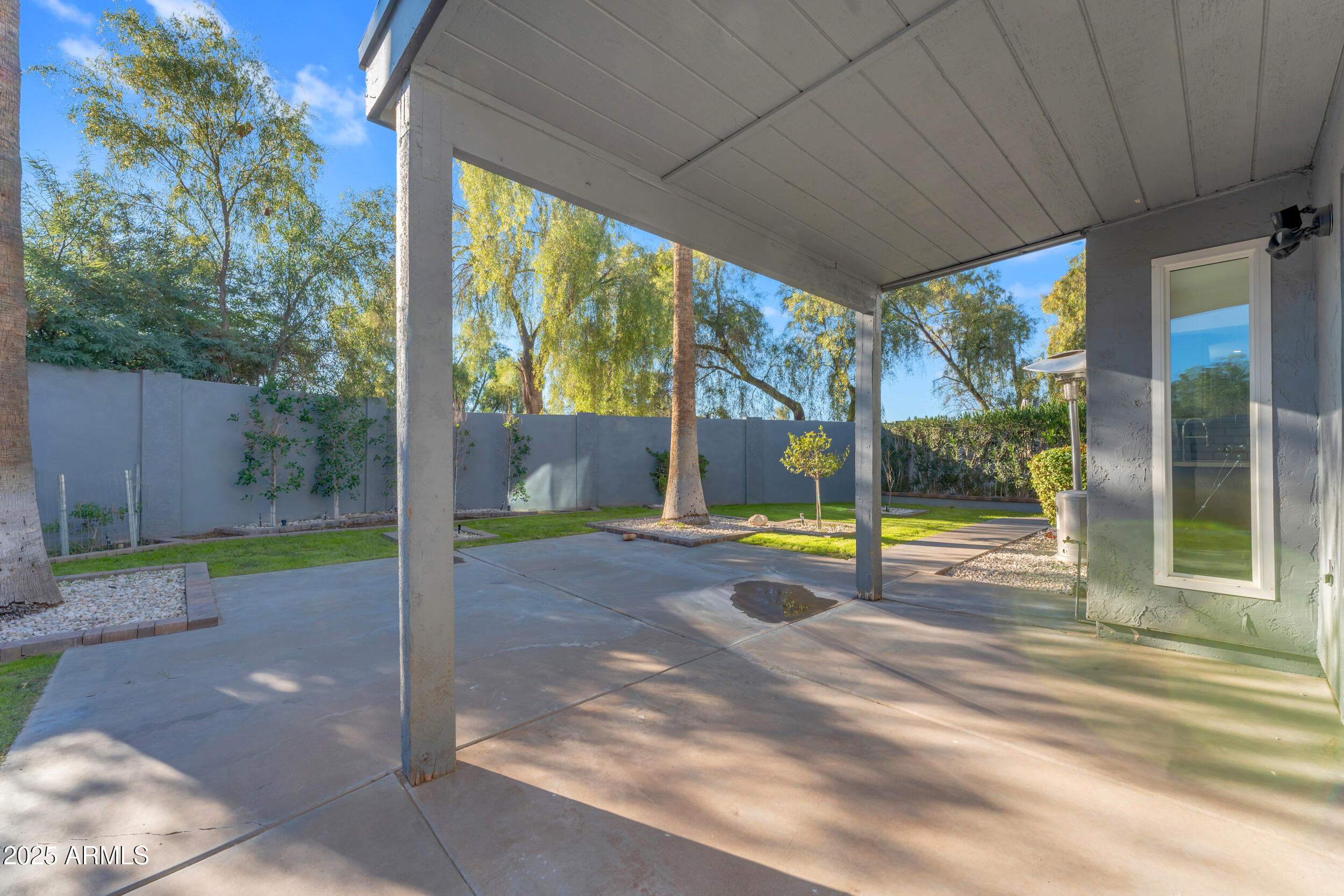 108 South Morning Ridge Drive Gilbert, AZ 85296 - Photo 42 of 49 a view of a room with porch and a backyard