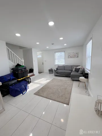 a living room with furniture and a couch