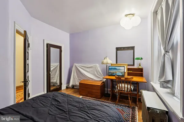 an white wall with a white comforter