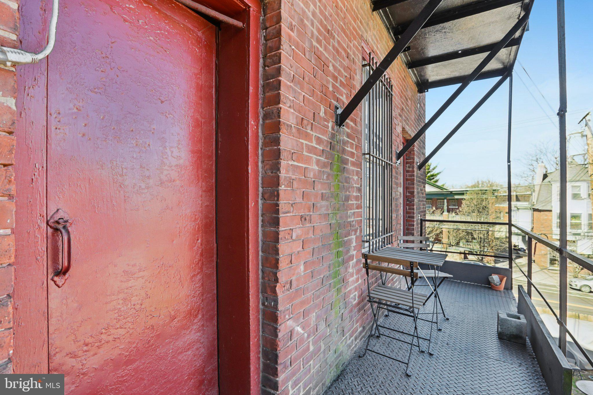 1003 South 46th Street, Unit 4 Philadelphia, PA 19143 - Photo 30 of 32 a view of balcony with furniture