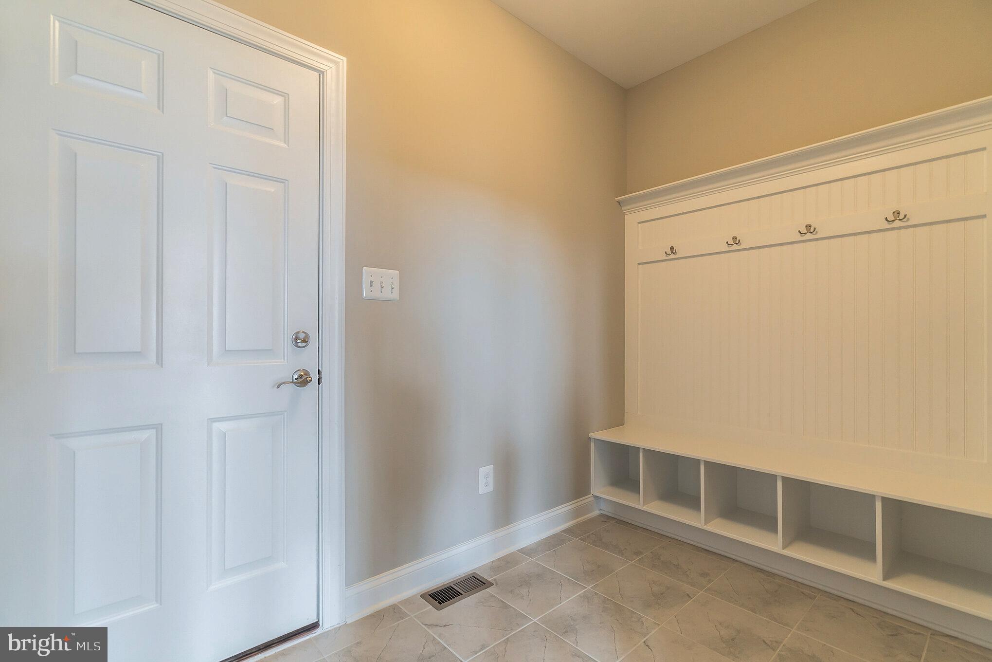 622 West Bay Front Road Lothian, MD 20711 - Photo 27 of 34 SUPER CONVENIENT MUD ROOM OFF THE OVERSIZE GARAGE