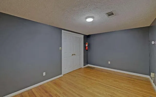 a kitchen with a stove and a microwave