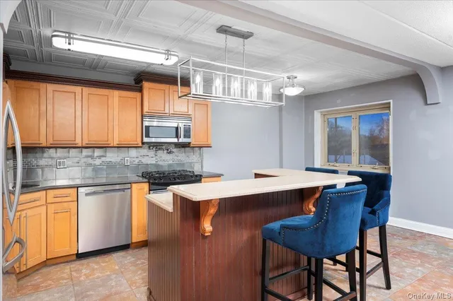 a view of a livingroom with wooden floor