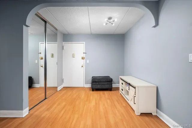 a living room with granite countertop furniture and fireplace