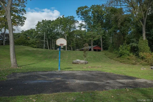 a front view of a house with barbeque grill