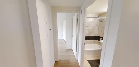 a bathroom with a sink a toilet and bathtub