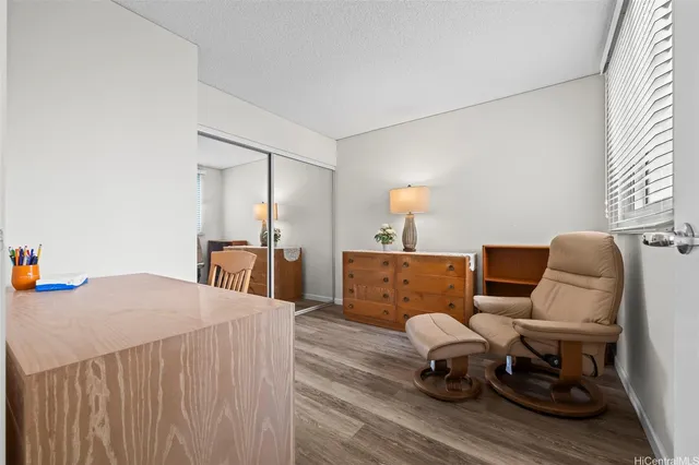 a view of a living room and dining room