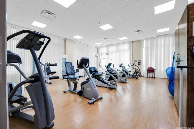 a view of a living room and kitchen