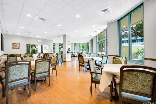 a room with furniture and a book shelf