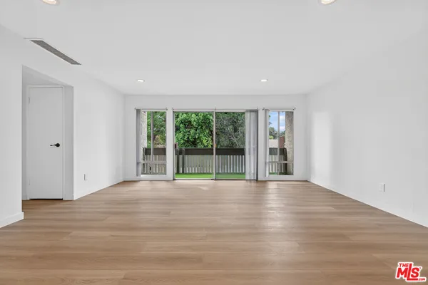 a view of balcony with furniture