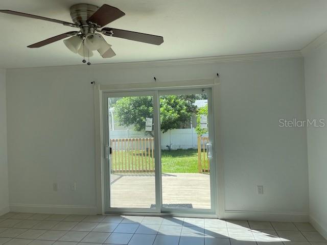2412 Webber Street Sarasota, FL 34239 - Photo 19 of 25 a view of a livingroom with a ceiling fan and window