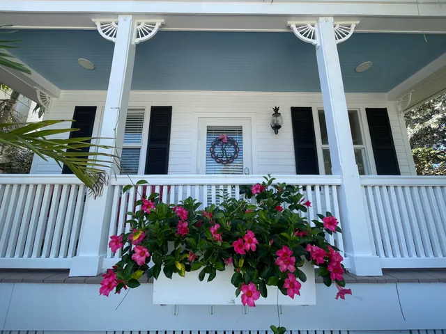 a flower pot with wooden wall