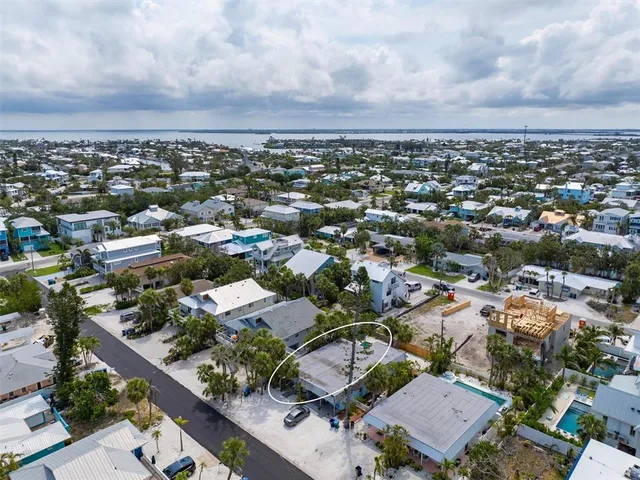 an aerial view of a city with lots of residential buildings